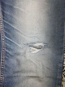 Distressed Blue Jeans