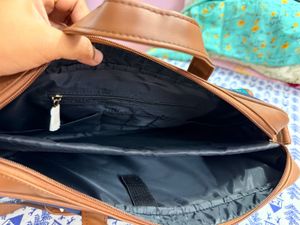 Turquoise Printed Laptop Bag- price negotiable