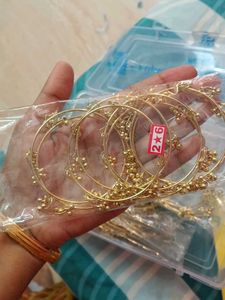 Gold Tone Charm Bangles Set