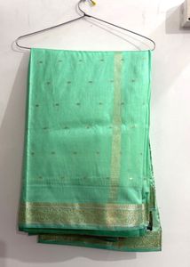 Elegant Mint Green Saree with Gold Border