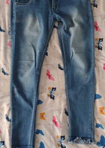 Light Wash Ripped Skinny Jeans