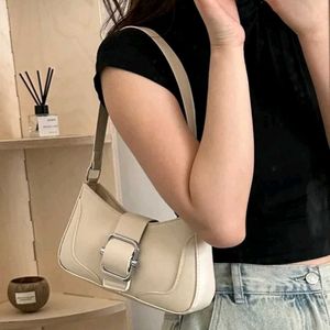 Beige sling bag