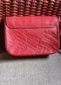 Chic Red Crossbody Bag with Charm