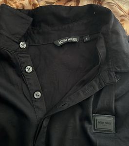 A Black T-shirt ( Not Even Wore Once)