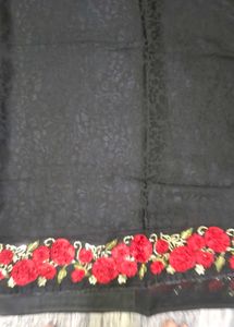Elegant Black Saree with Red Floral Embroidery