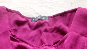 A beautiful decent purple top with florry sleeves