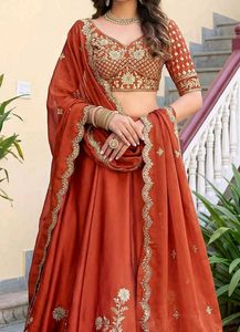 Elegant Orange Embroidered Lehenga Choli