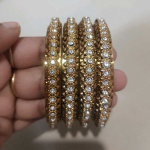 Elegant Gold Tone Bangle Set