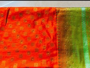 Vibrant Orange Silk Saree with Green Border