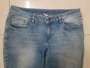 Low Rise Blue Ripped Demins