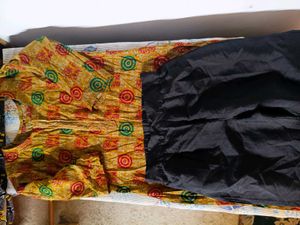 Yellow Printed Kurta with Black Pants