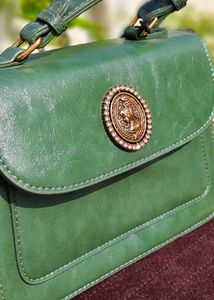 Chic Green Handbag with Gold Accent