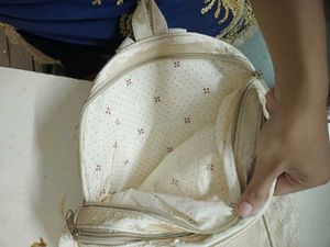 Quilted Backpack with Embellishments