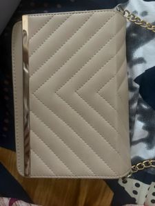 Elegant Beige Quilted Sling Bag