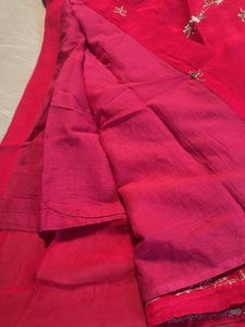 Vibrant pink suit with Silver Border