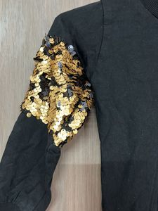 Black sequin sleeve top