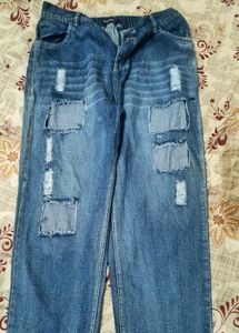 Distressed Patchwork Denim Jeans