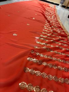 Vibrant Orange Sequined Saree