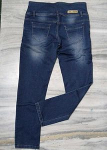 Distressed High-Waisted Denim Jeans