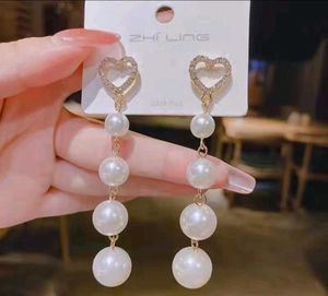 Heart & Pearl Dangle Earrings.