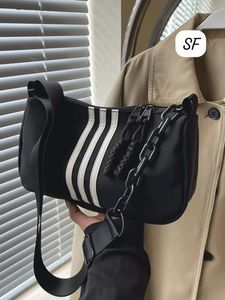 Sporty Black Crossbody Bag with White Stripes