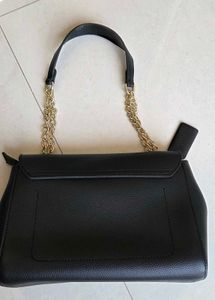 Chic Black Handbag with Gold Chain