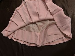 baby pink tennis skirt with pleats