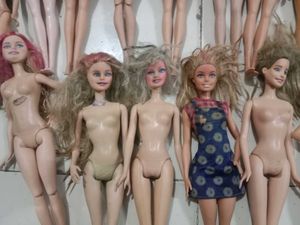 Used Defective Barbie dolls