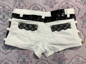 Stylish White Denim Shorts with Black Lace Detail