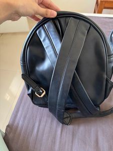 the cutest black mini backpack