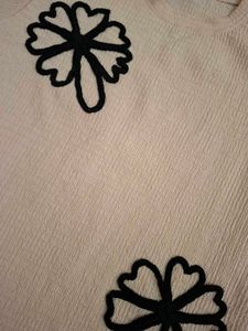 Cream Textured Top with Black Flower Applique