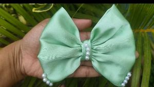 Elegant Black Pearl Bow Hair Clip