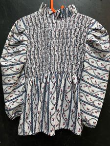 Smocked Floral Peplum Top