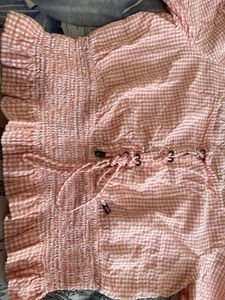 Chic Orange Gingham Smocked Top