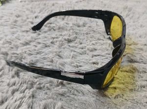 Stylish Black Sunglasses with Yellow Lenses