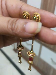 Elegant Gold Earrings with Red Stones