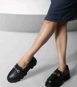 Black Loafers with Gold Detail