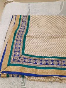 Embellished Beige Saree with Blue Border