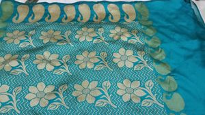 Beautiful Blue Saree with Intricate Patterns