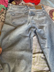 Distressed Light Wash mid rise Wide Leg Jeans