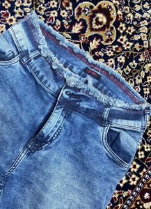 Ripped High-Waisted Jeans
