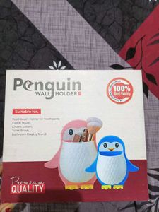 Penguin holder wall mount