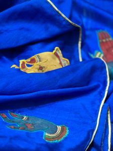 Vibrant Blue Saree with Hand Motifs