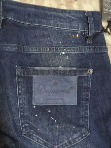 Stylish Dark Wash Jeans with Unique Embellishments