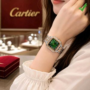Elegant Two-Tone Watch with Green Dial