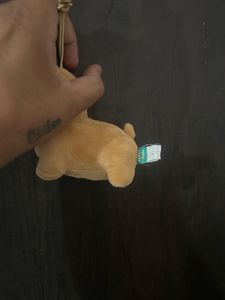 brown plush dog bag charm/keyring with a sleeping