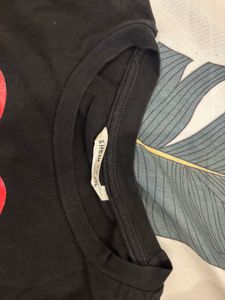 Black crop top with red heart