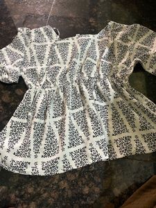 Light Green Peplum Top with Geometric Print