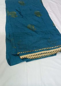 Elegant Teal Saree with Gold Floral Print
