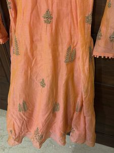 embroidered orange anarkali suit